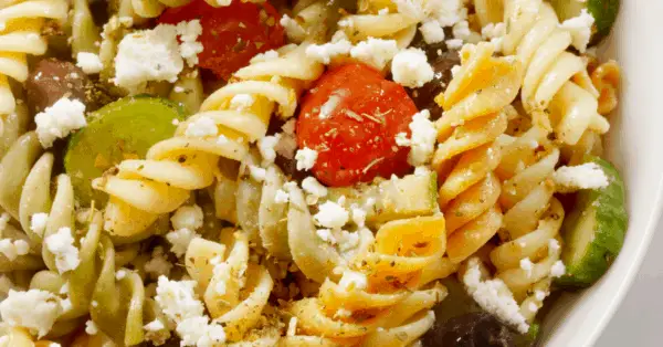 greek pasta salad in a bowl