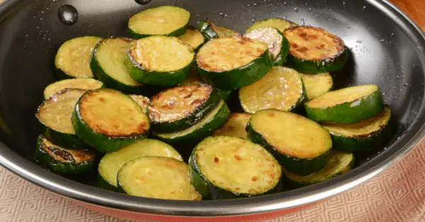 sauteed zucchini in a frying pan