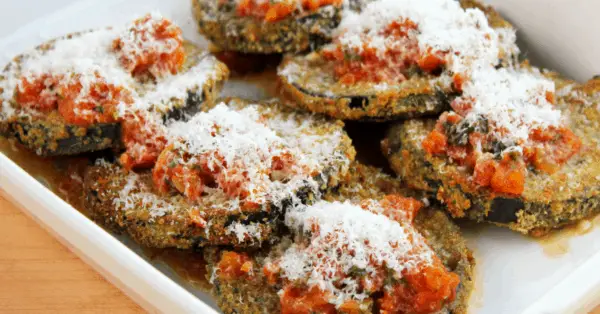 eggplant with sprinkled cheese on a plate