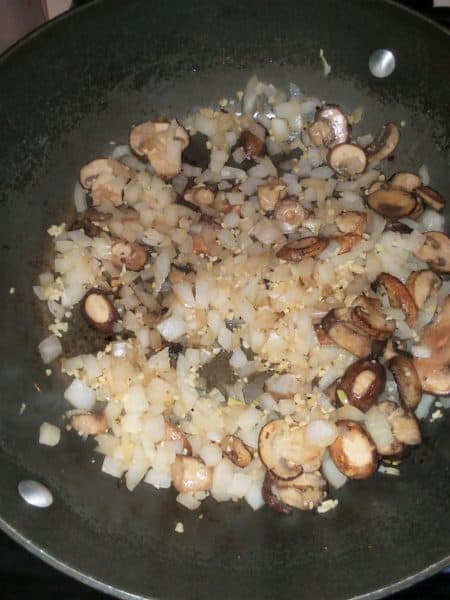 mushrooms, onions in frying pan