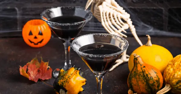 black Halloween cocktail in glass