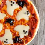 halloween pizza with ghosts on top