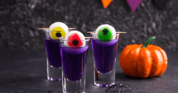 purple halloween drink with floating eyeballs