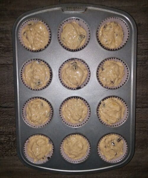 raw banana muffin batter in muffin liners
