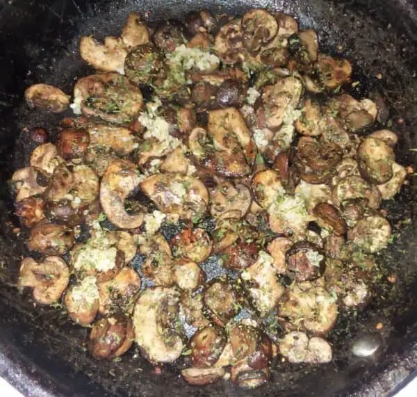 sauteed mushrooms in frying pan
