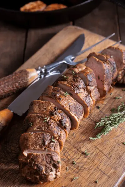 pork tenderloin on a cutting board