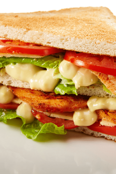 chicken sandwich with lettuce tomato and cheese